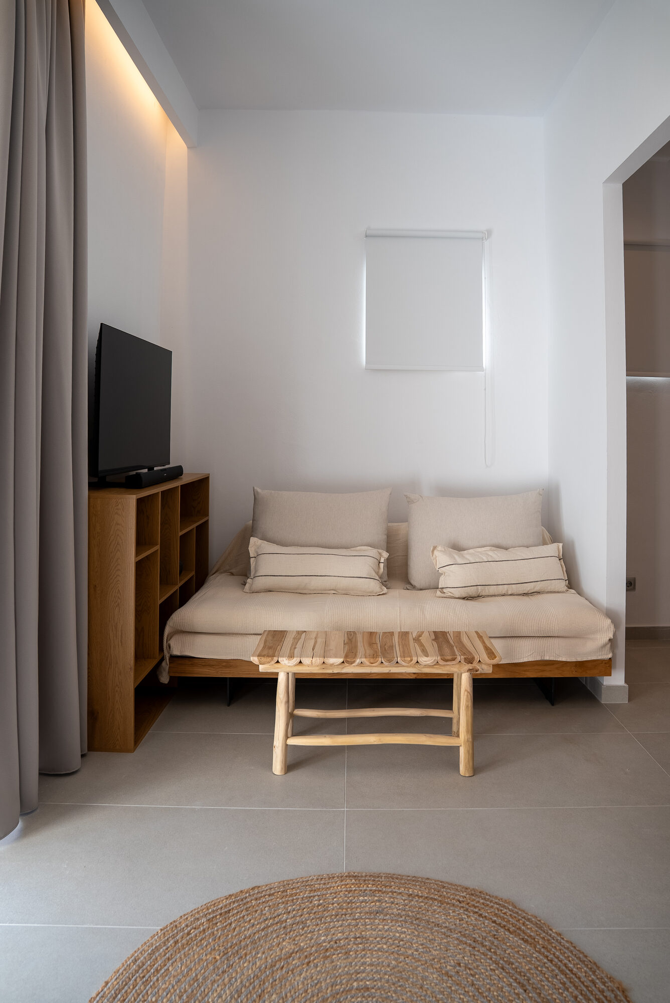 Living area with seating and television